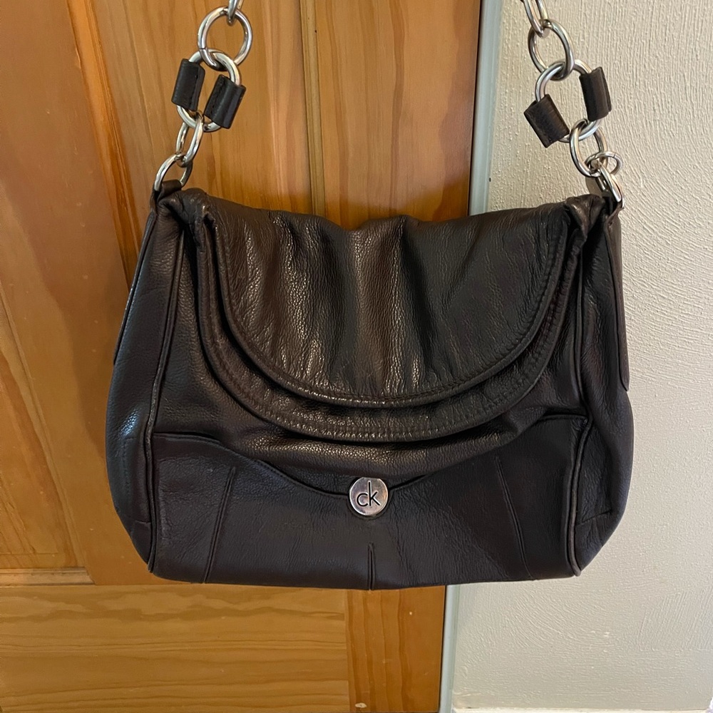 Calvin Klein chocolate brown folder over bag